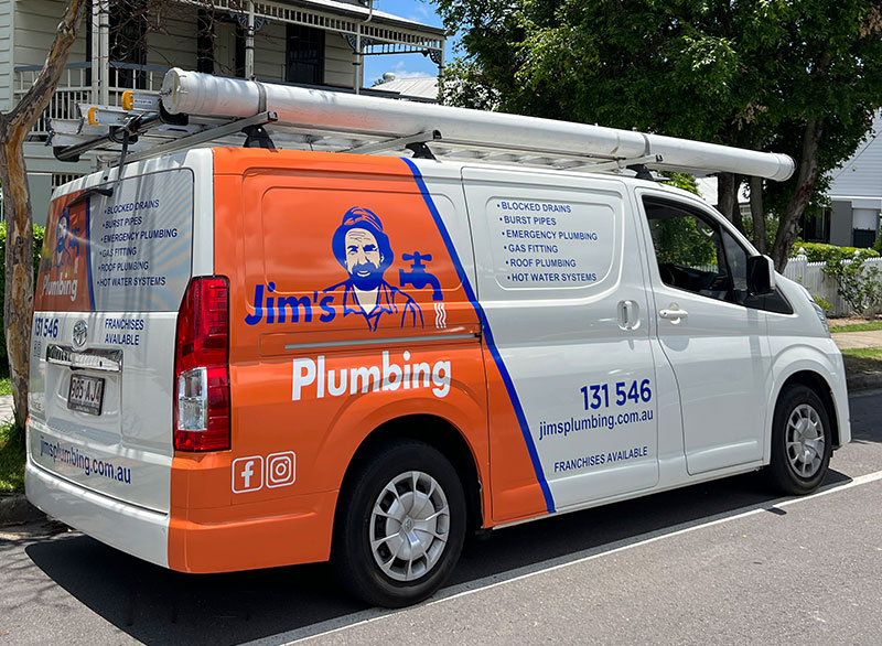 Jim's Plumbing van parked outside suburban house