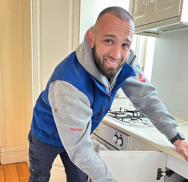 Volkan fixing a kitchen drain